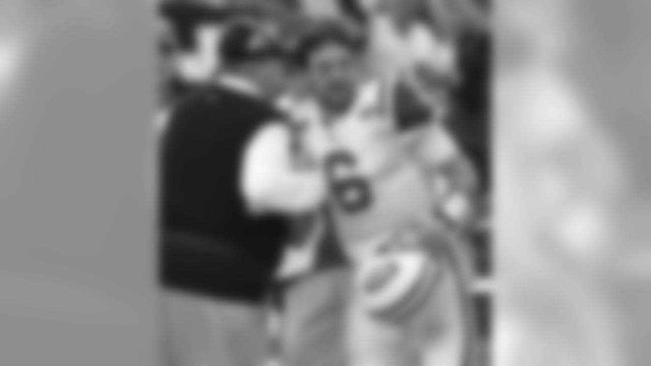 New York Jets quarterback Mark Sanchez celebrates with coach Rex Ryan during the fourth quarter against the San Diego Chargers in an NFL divisional playoff football game, Sunday, Jan. 17, 2010, in San Diego. (AP Photo/Jeff Chiu)