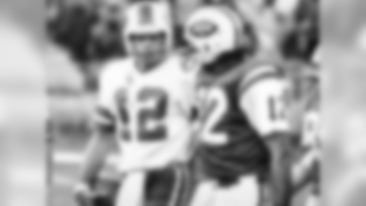 New York Jets quarterback Joe Namath, right, and Buffalo Bills quarterback Joe Ferguson, have each other's numbers as they walk off the field at New York's Shea Stadium in New York, Nov. 2, 1975. (AP Photo/Ray Stubblebine)