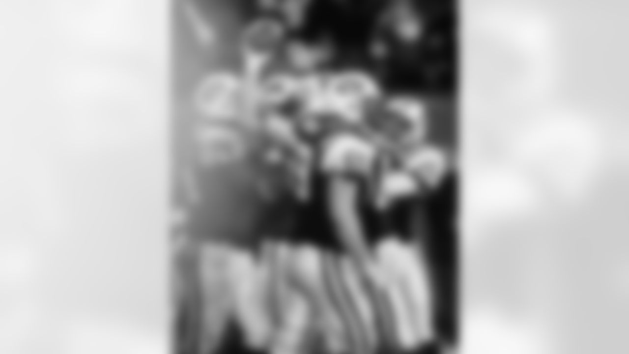 T Jumbo Elliot and his teammates celebrate his touchdown reception that capped off a 23-point fourth quarter comeback for the Jets and sent the game into overtime where they would win by a score of 40-37 in a game that came to be known as the Monday Night Miracle.