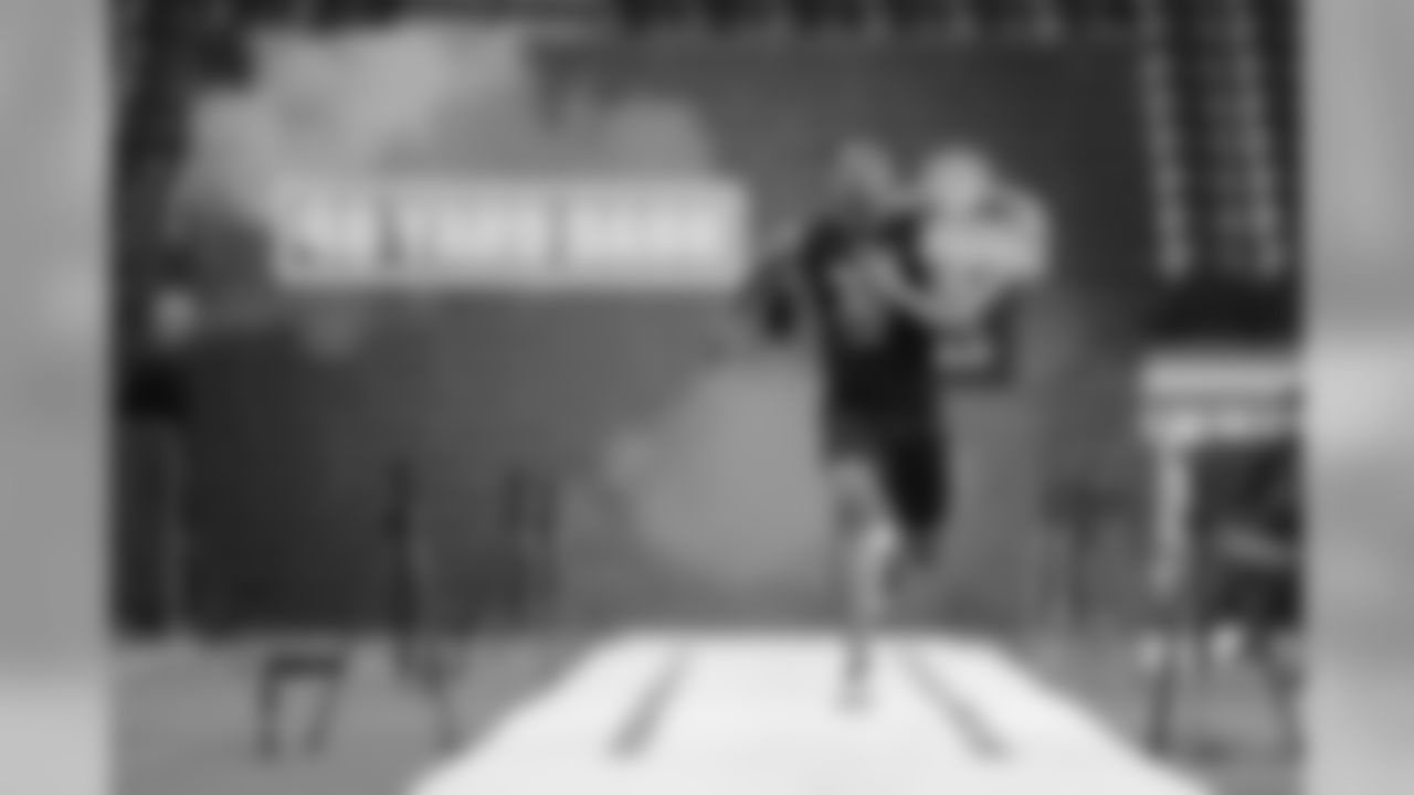 Clemson defensive back A J Terrell runs the 40-yard dash at the NFL football scouting combine in Indianapolis, Sunday, March 1, 2020. (AP Photo/Michael Conroy)