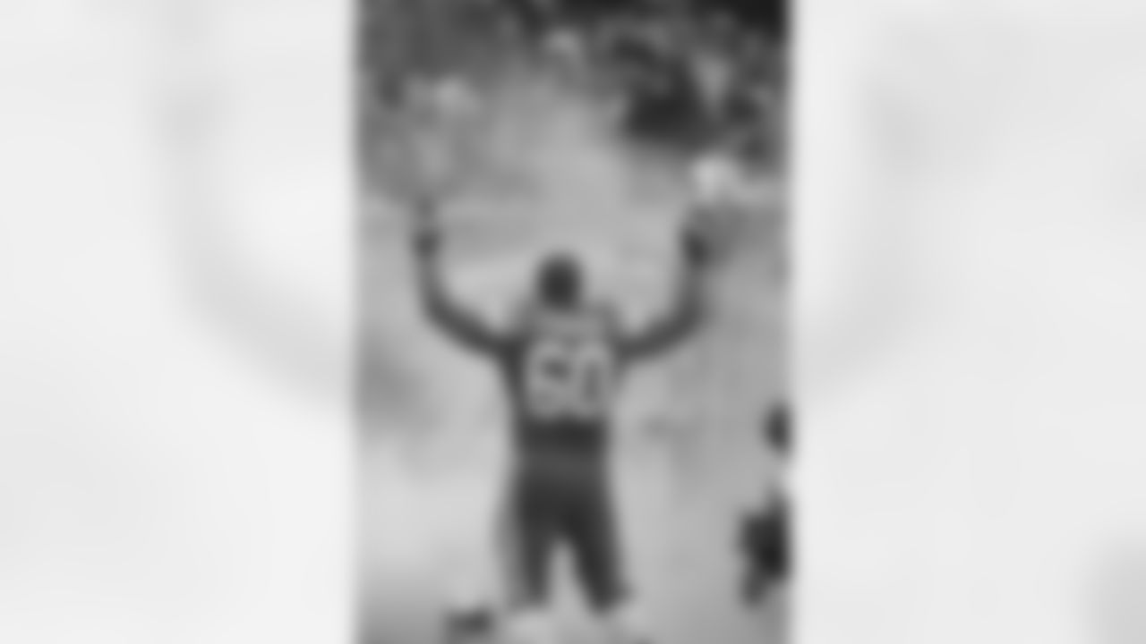 T D'Brickashaw Ferguson salutes the fans before starting his 125th consecutive regular season game. He has the longest consecutive-starts streak from the beginning of his career among all active NFL players.