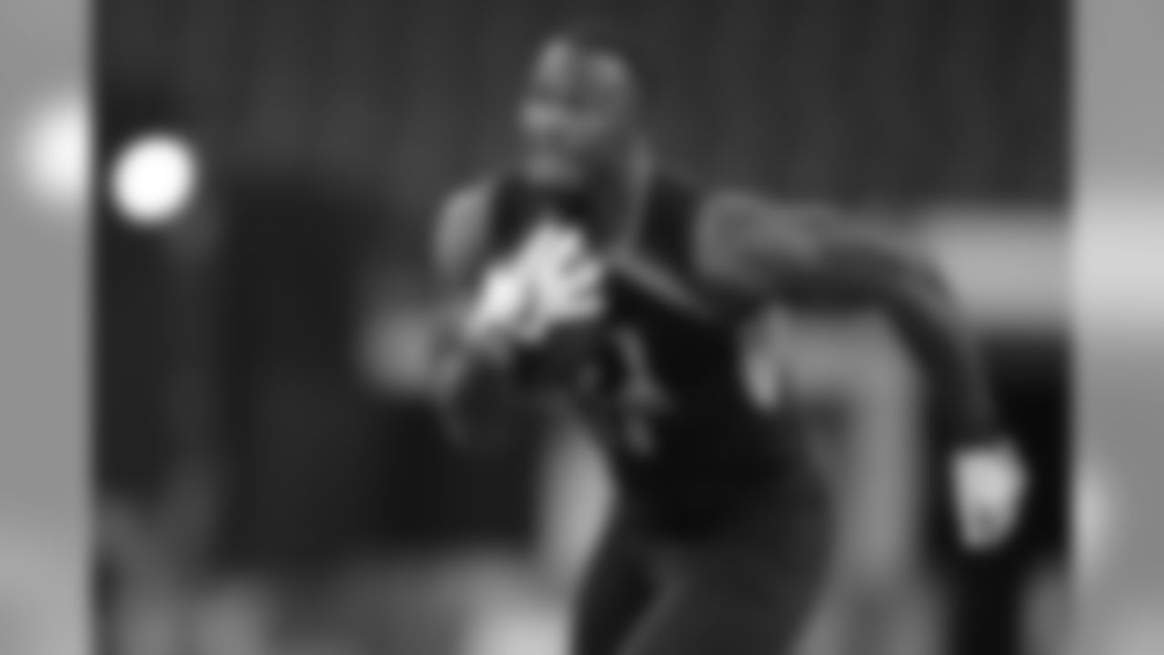 LSU linebacker Devin White runs a drill at the NFL football scouting combine in Indianapolis, Sunday, March 3, 2019. (AP Photo/Michael Conroy)