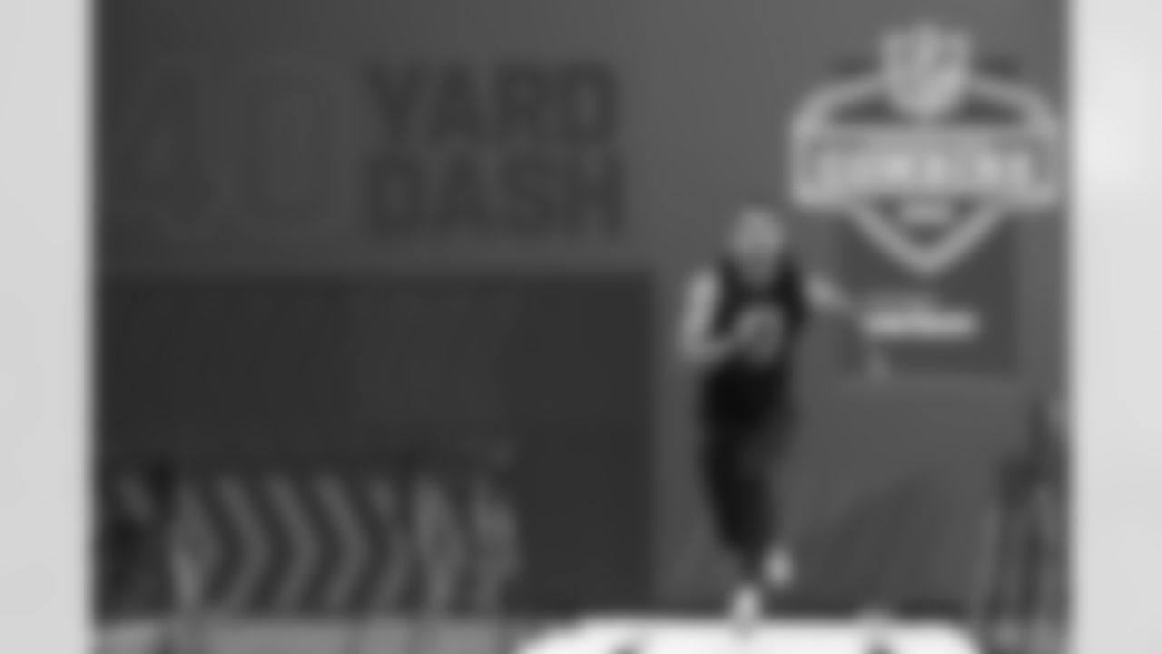 Cincinnati quarterback Desmond Ridder runs the 40-yard dash during the NFL football scouting combine Thursday, March 3, 2022, in Indianapolis. (AP Photo/Darron Cummings)