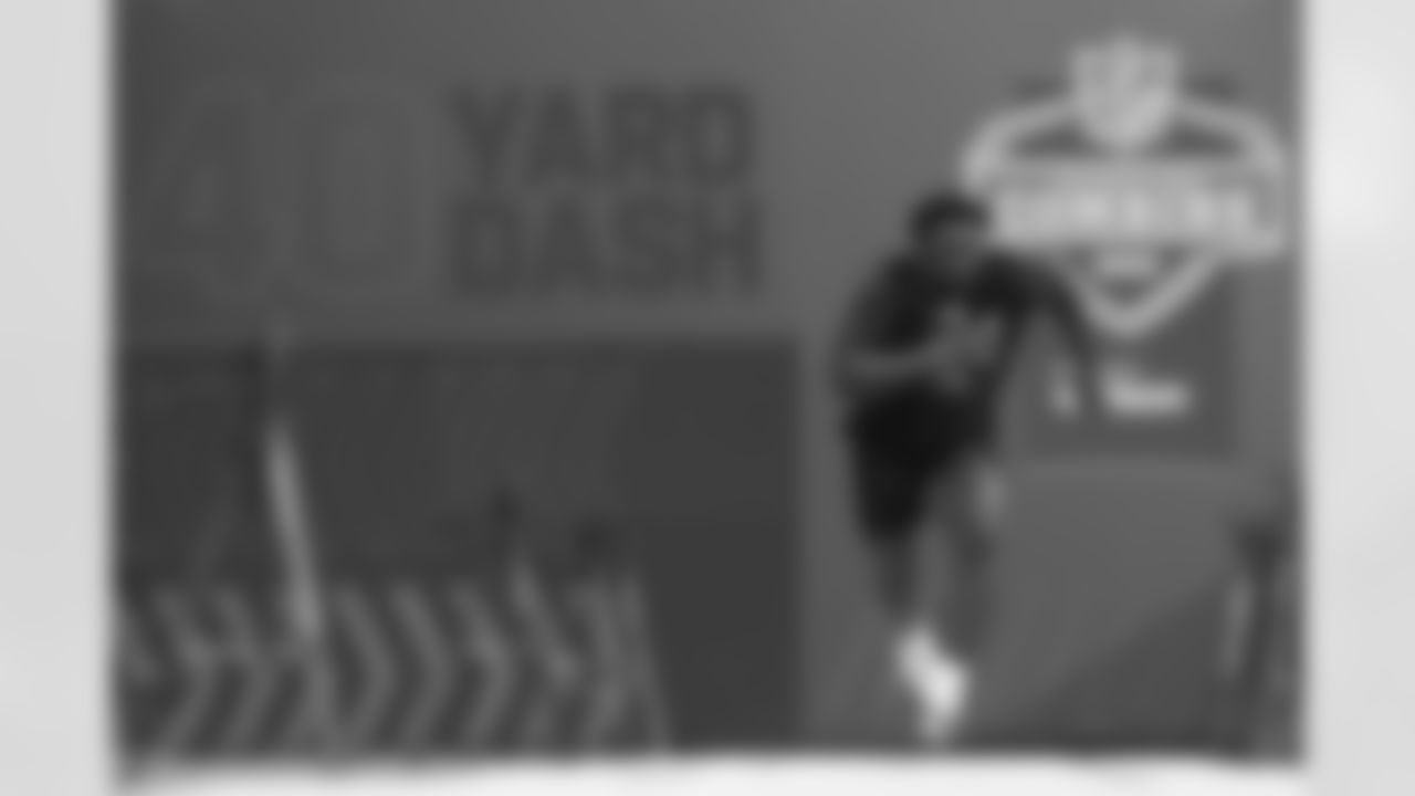 Georgia defensive lineman Devonte Wyatt runs the 40-yard dash during the NFL football scouting combine, Saturday, March 5, 2022, in Indianapolis. (AP Photo/Darron Cummings)