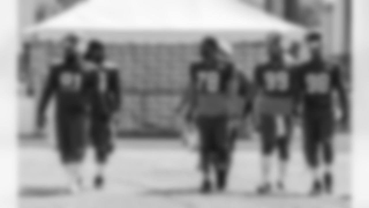 As they do every morning, the defensive line arrived to the practice field together in an effort to promote unity amongst its members, according to LB Quinton Coples, No. 98.