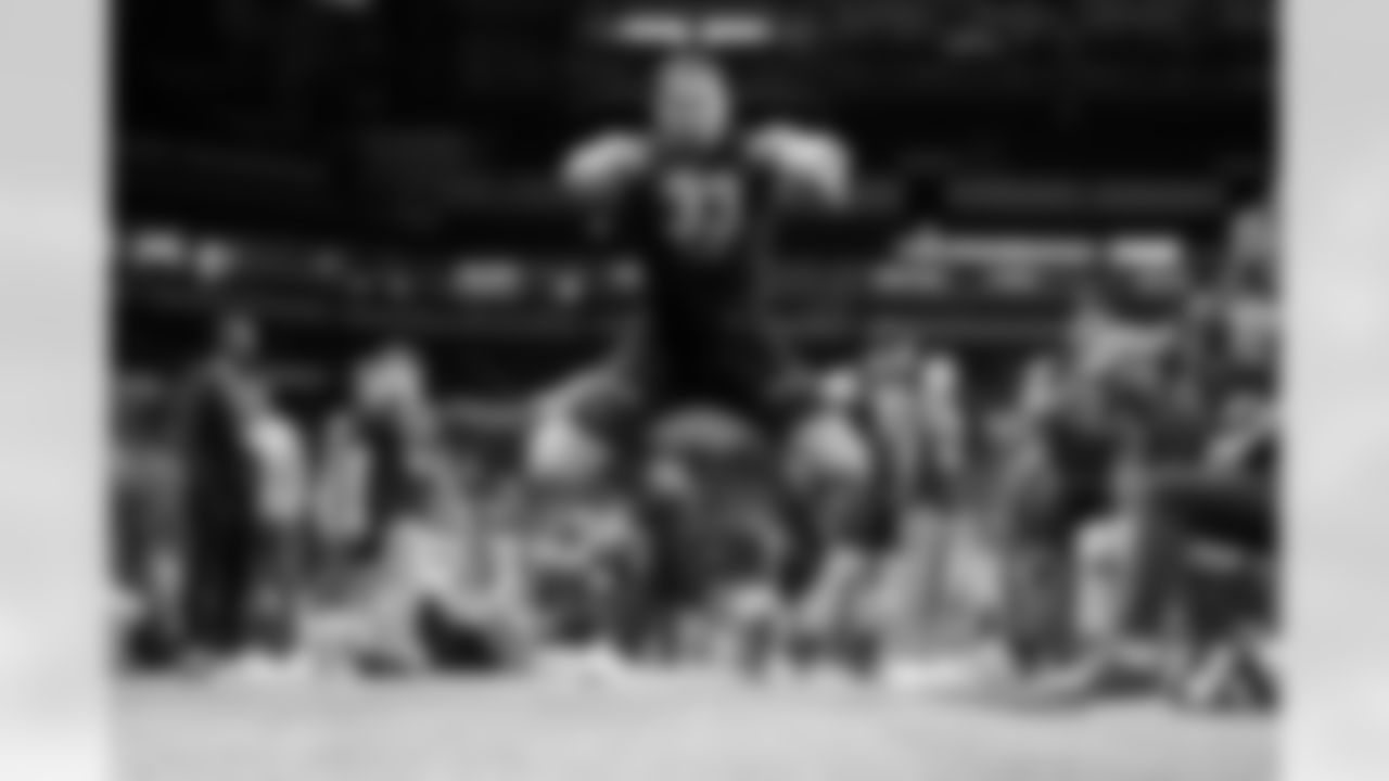 Penn State linebacker Brandon Smith (33) participates in the broad jump at the NFL football scouting combine in Indianapolis, Saturday, March 5, 2022. (AP Photo/Steve Luciano)