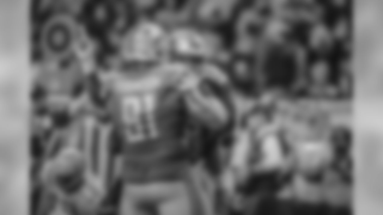Detroit Lions defensive tackle A'Shawn Robinson (91) and Detroit Lions defensive end Romeo Okwara (95) celebrate a strip sack during a NFL football game against the Green Bay Packers on Sunday, Oct. 7, 2018 in Detroit.