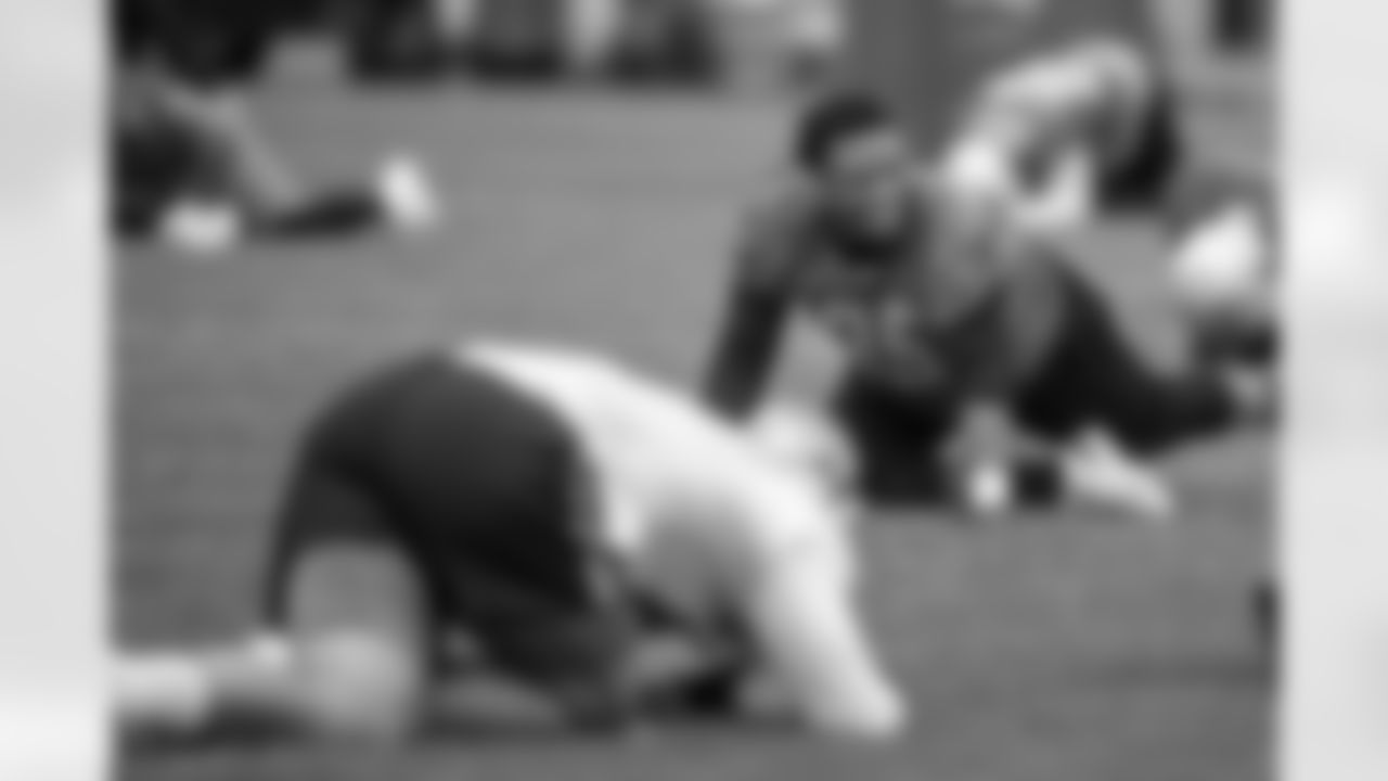 Detroit Lions defensive end Romeo Okwara (95) stretches during Day 2 of OTAs on Tuesday, May 21, 2019 in Allen Park, Mich. (Detroit Lions via AP)