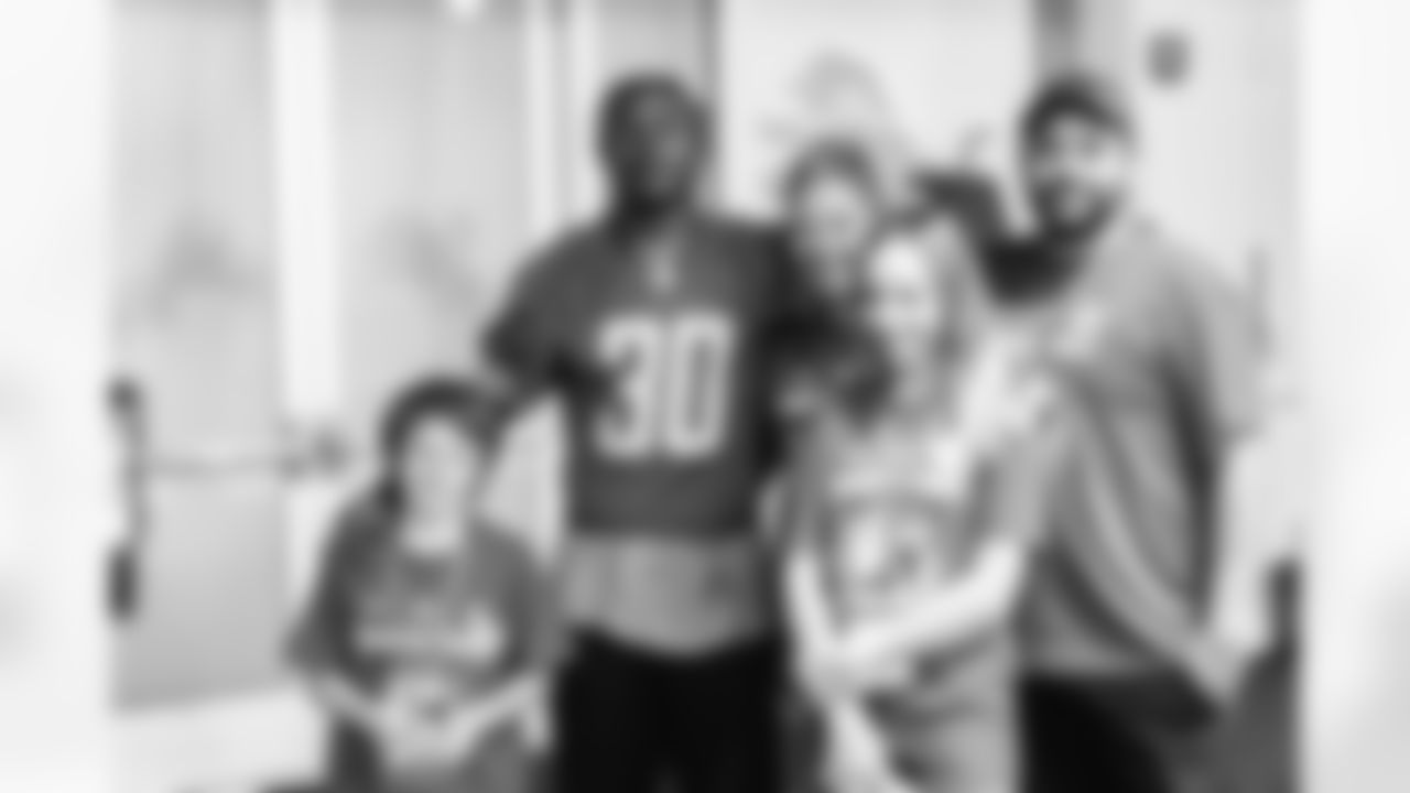 Detroit Lions running back Jamaal Williams (30) meeting with TAPS families during a Saturday walkthrough at the Lions Training Facility in Allen Park, MI on November 5th, 2022. (Joshua Hanford/Detroit Lions).