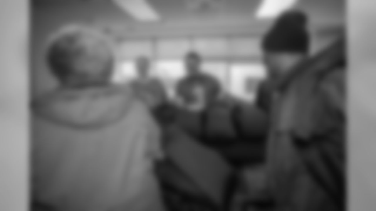 Eddie Murray helps distribute Empowerment Plan coats, socks and hand warmers to homeless veterans on Thursday, Nov. 8, 2018 in Detroit.