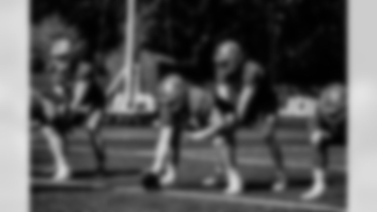 Detroit Lions center Frank Ragnow (77) Detroit Lions quarterback Jared Goff (16) during Lions practice at the Training Facility in Allen Park, MI on September 29, 2021. (Jeff Nguyen/Detroit Lions)