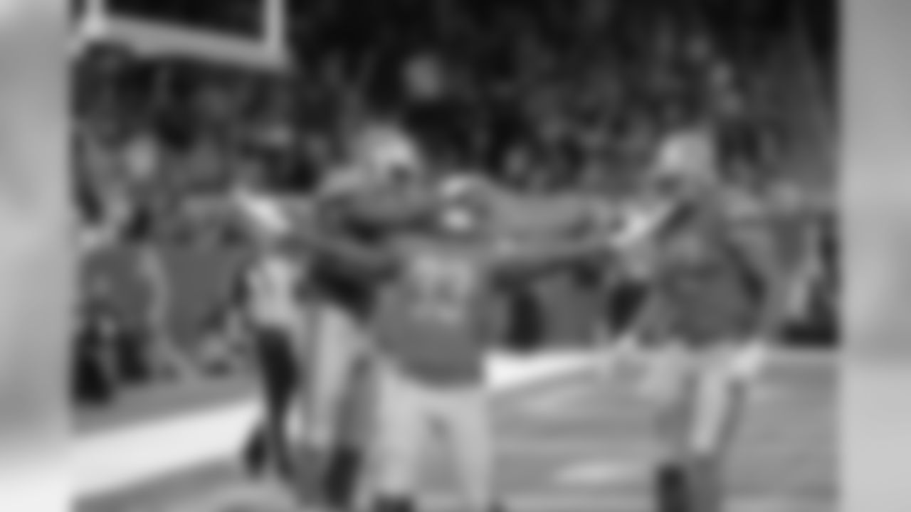 Detroit Lions running back Kerryon Johnson (33) celebrates a touchdown during a NFL football game against the Green Bay Packers Sunday, Dec. 29, 2019 in Detroit. (Detroit Lions via AP).