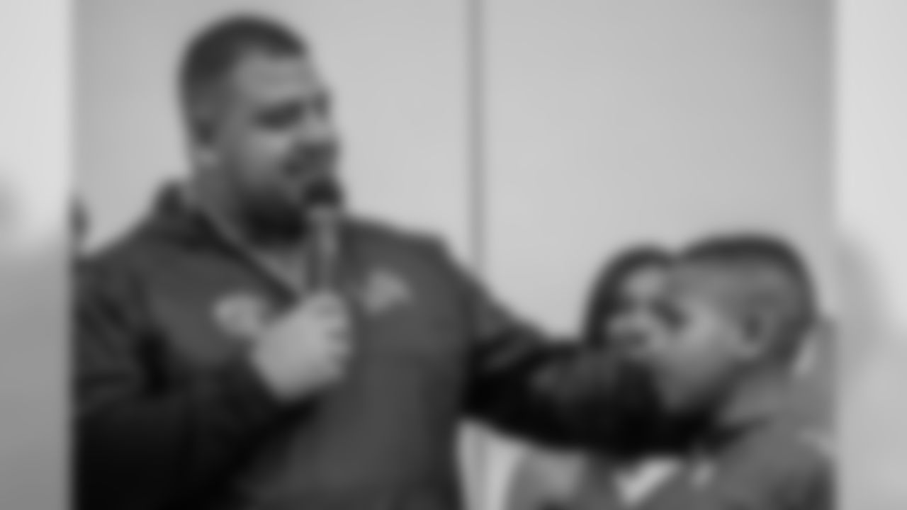 NFL Next 100 Super Bowl commercial contest winner Judah's father with Judah at a Detroit Lions youth football assembly at Knapp Forest Elementary School, Monday, Jan. 27, 2020, in Grand Rapids, Mich.