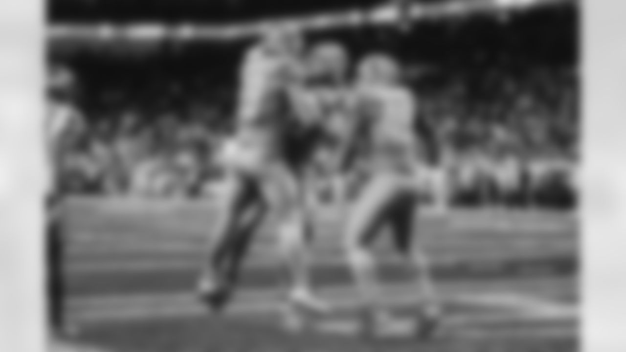 Detroit Lions tight end Brock Wright (89), Detroit Lions tight end T.J. Hockenson (88), and Detroit Lions fullback Jason Cabinda (45) celebrate after scoring a touchdown during a NFL football game against the Minnesota Vikings on Sunday, December 5, 2021 in Detroit, MI. (Jeff Nguyen/Detroit Lions).