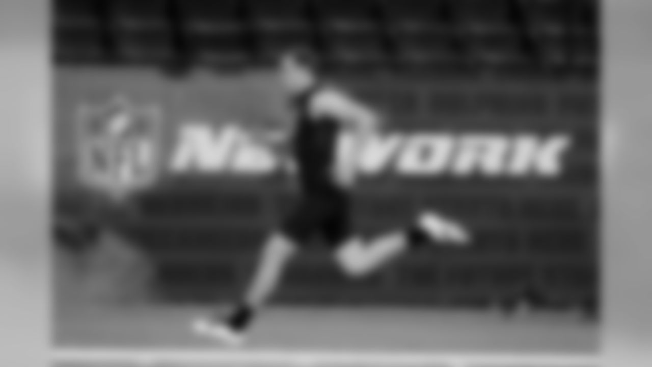 Iowa quarterback Nate Stanley runs the 40-yard dash at the NFL football scouting combine in Indianapolis, Thursday, Feb. 27, 2020. (AP Photo/Charlie Neibergall)