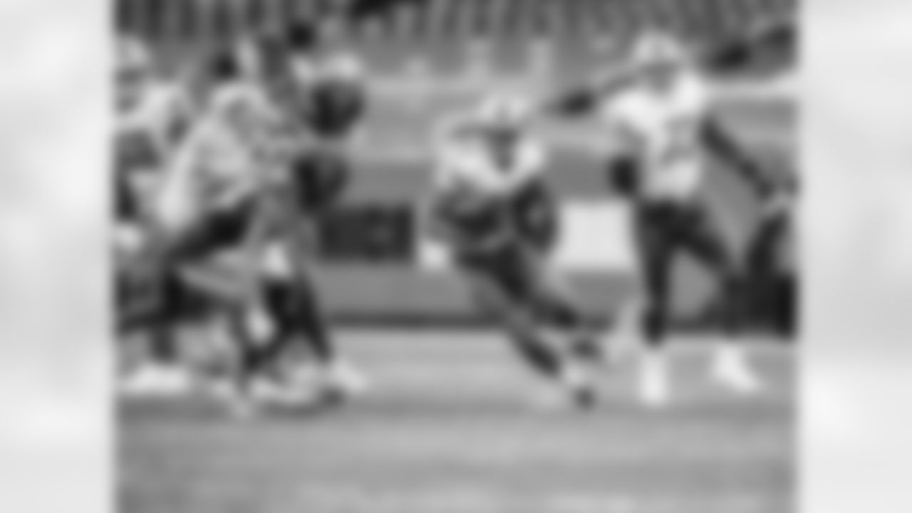 Detroit Lions running back Adrian Peterson (28) runs during an NFL football game against the Chicago Bears on Sunday, Dec. 6, 2020 in Chicago, IL. (Detroit Lions via AP).
