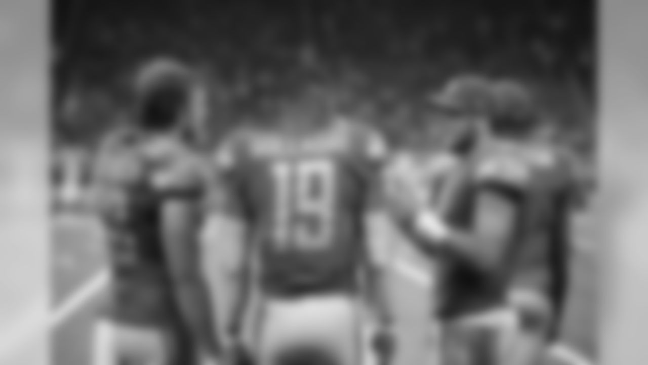 Detroit Lions quarterback Matthew Stafford (9) talks to Detroit Lions tight end T.J. Hockenson (88) and Detroit Lions wide receiver Kenny Golladay (19) during a NFL football game against the Los Angeles Chargers Sunday, Sept. 15, 2019 in Detroit. (Detroit Lions via AP).