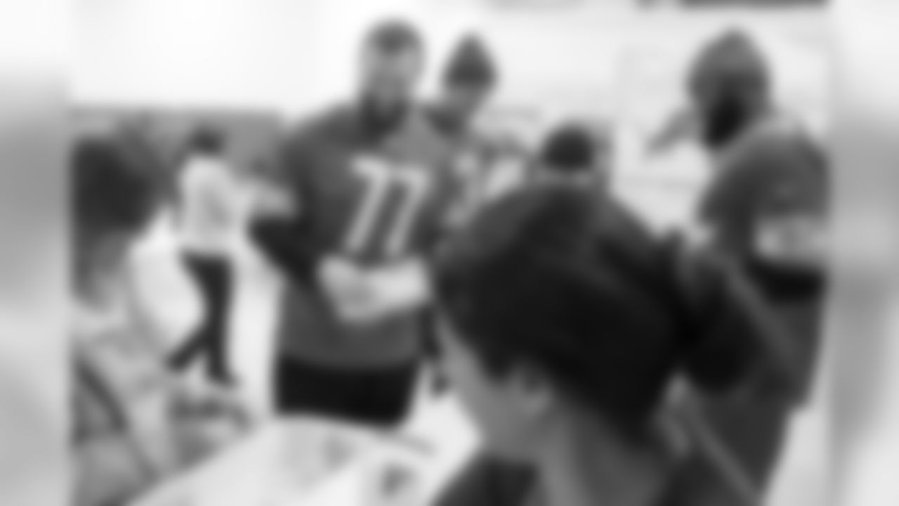 Detroit Lions offensive lineman Frank Ragnow (77) helps pack military care packages at Humanetics headquarters Tuesday, Oct. 12, 2019 in Farmington Hills, Mich.