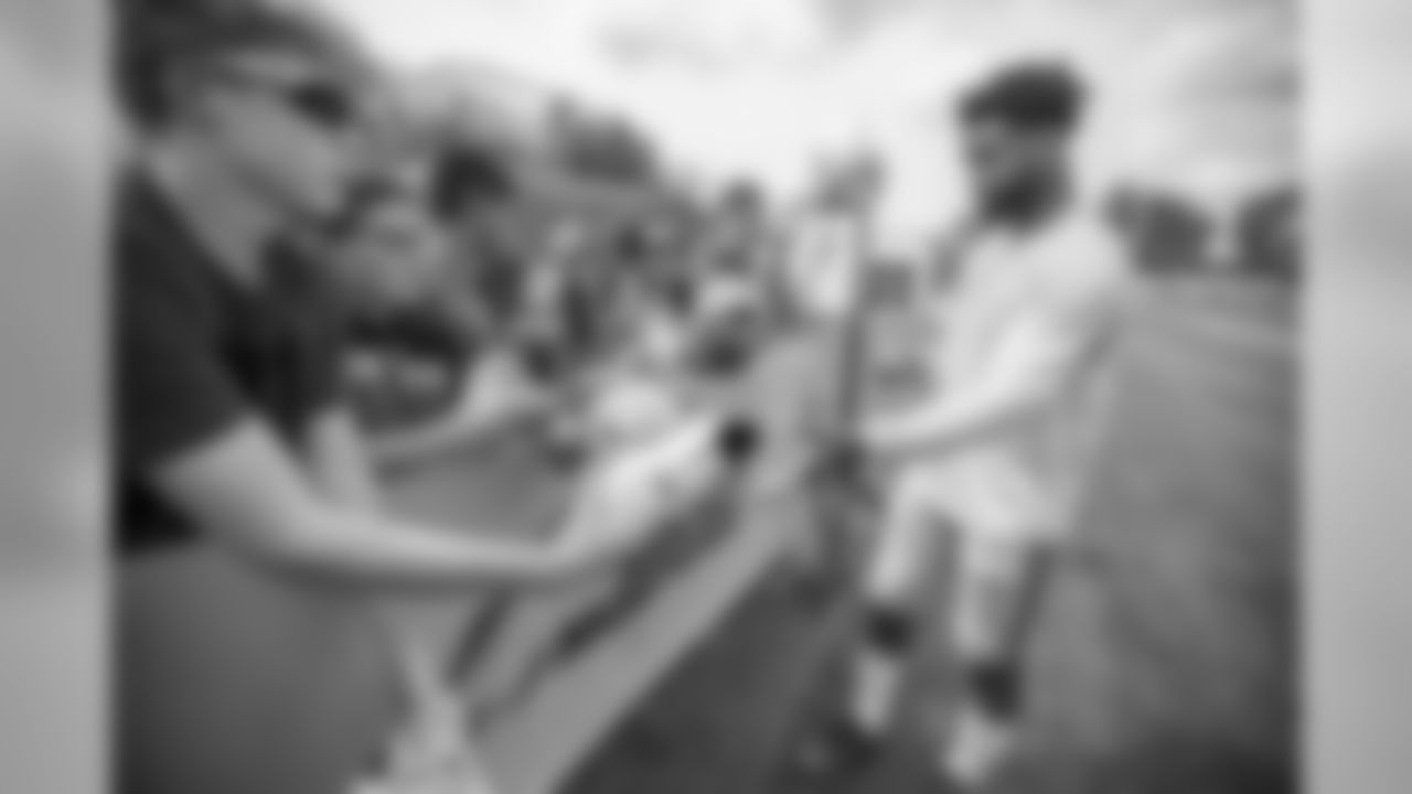 Detroit Lions cornerback Darius Slay signs autographs for fans following training camp practice on Monday, July 30, 2018 in Allen Park, Mich. (Detroit Lions via AP)