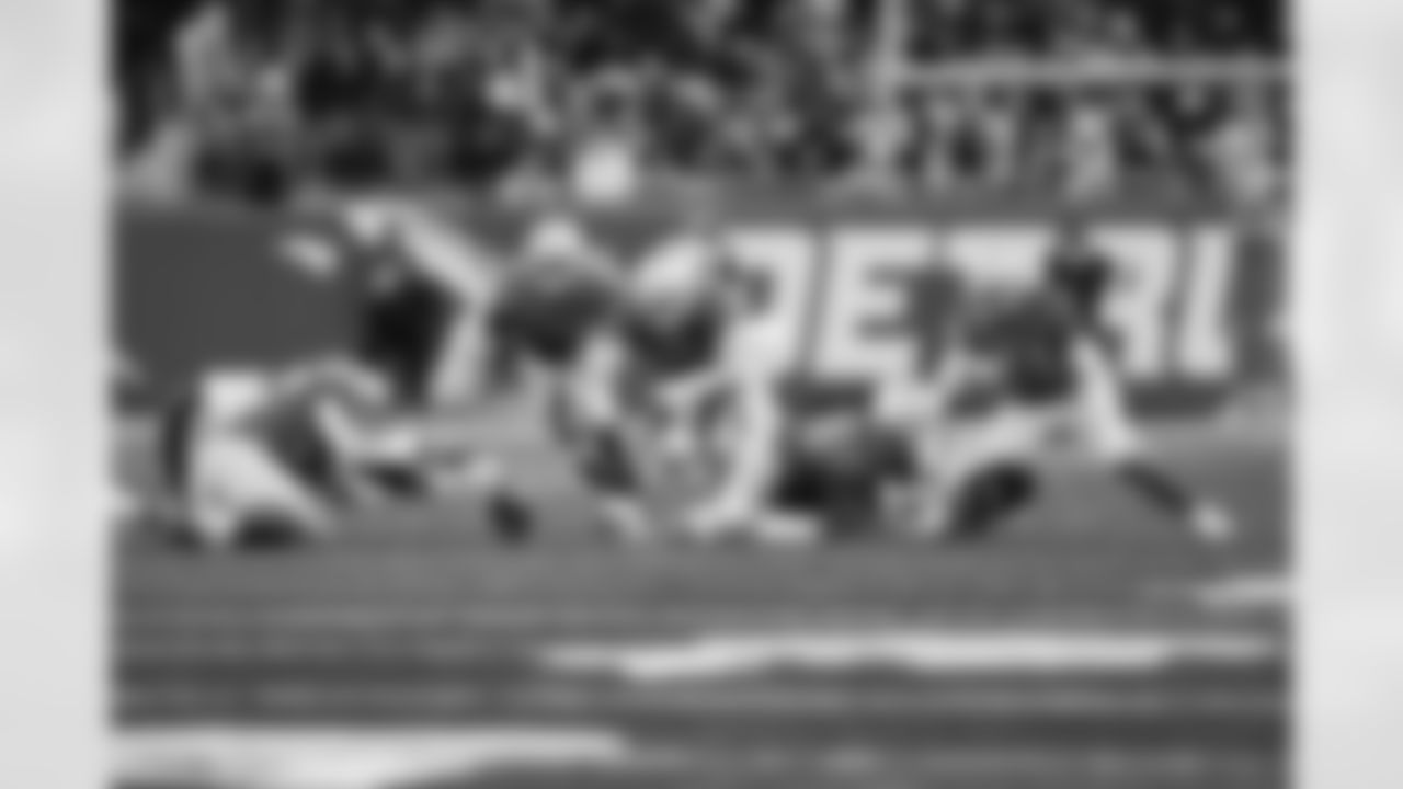Detroit Lions linebacker James Houston (59) forces a fumble and Detroit Lions defensive lineman Aidan Hutchinson (97) recovers the ball during a NFL football game against the Chicago Bears on Sunday, January 1, 2023 in Detroit, MI. (Jeff Nguyen/Detroit Lions).