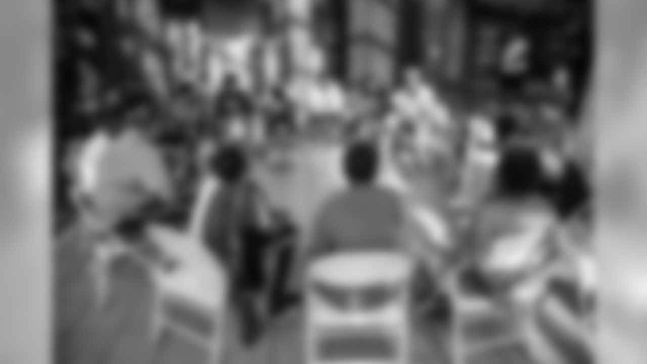Tavon Wilson joins participants for a conversation on social resilience at on Thursday, June 7, 2019 in Detroit.