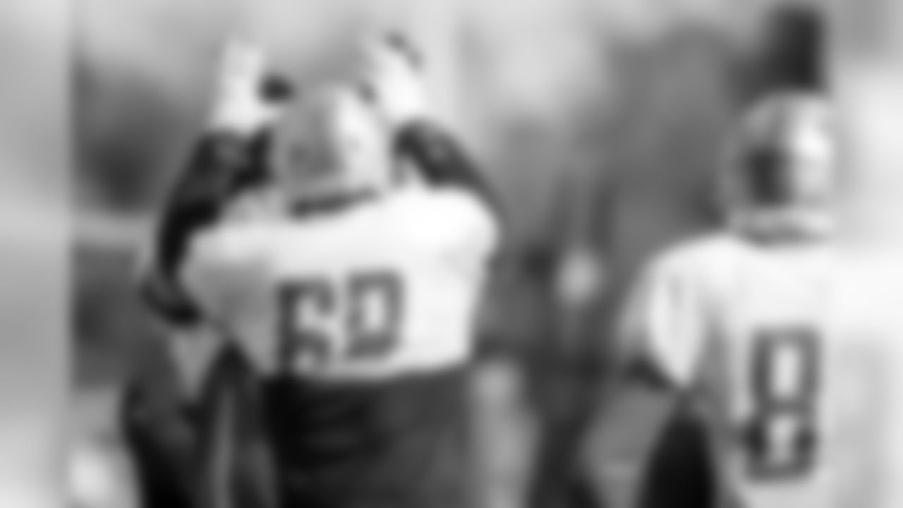 Detroit Lions tackle Taylor Decker (68) high-fives Detroit Lions guard Joe Dahl (66) during practice at the Detroit Lions training facility on Wednesday, Oct. 24, 2018 in Allen Park, Mich. (Detroit Lions via AP)