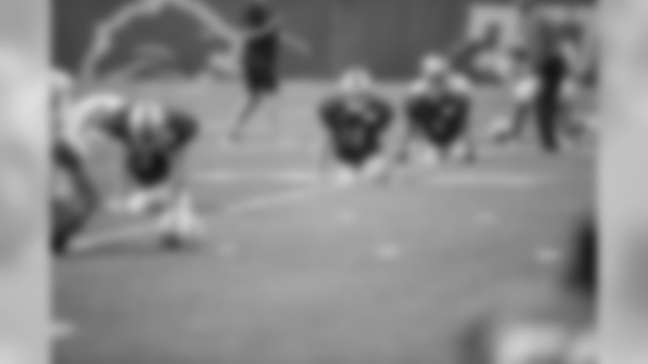 Detroit Lions quarterbacks stretch before practice at the Detroit Lions training facility on Tuesday, Aug. 28, 2018 in Allen Park, Mich. (Detroit Lions via AP)