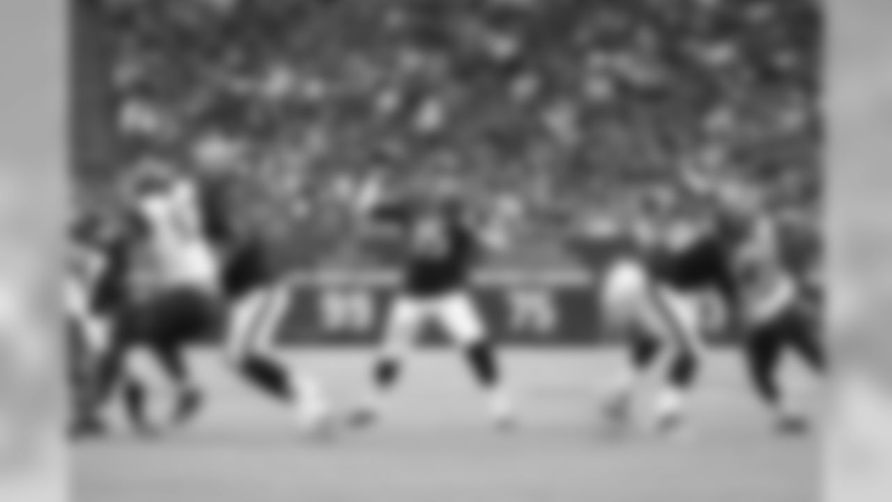 Houston Texans quarterback Ryan Mallett (15) looks to pass behind the blocks of Oday Aboushi (78) Chris Clark (74)during a Week 3 NFL game against the Tampa Bay Buccaneers on Sunday, Sept. 27, 2015, in Houston. The Texans won the game 19-9. (Matt Patterson via AP)