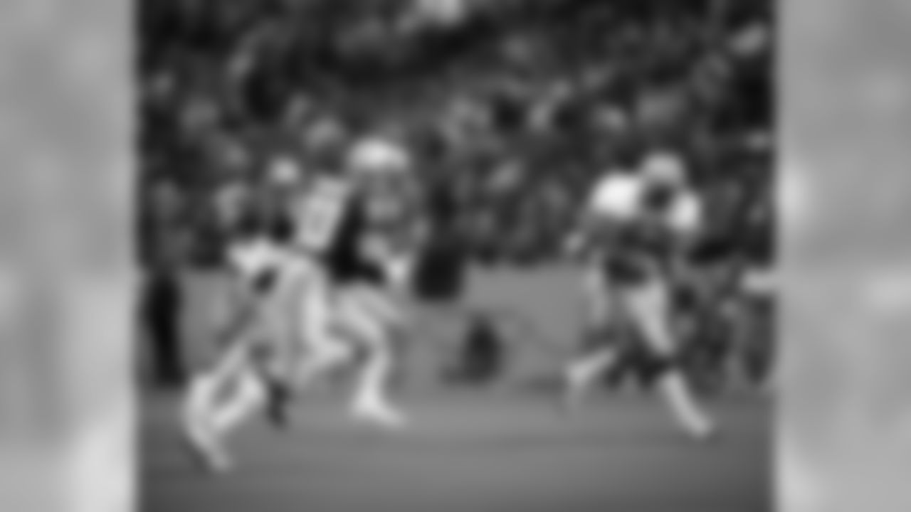 Green Bay Packers tight end Paul Coffman (82) runs upfield with a reception during an NFL game against the Detroit Lions, Oct. 9, 1983. The Lions defeated the Packers 38-14 at the Silverdome. (AP Photo/Vernon Biever)
