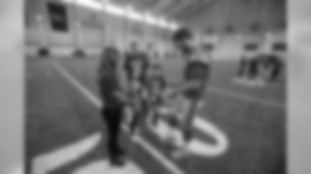 Detroit Lions quarterback Matthew Stafford (9) meets with families from Tragedy Assistance Program For Survivors (TAPS) after the team's walkthrough at the Detroit Lions training facility on Saturday, Nov. 17, 2018 in Allen Park, Mich. (Detroit Lions via AP)