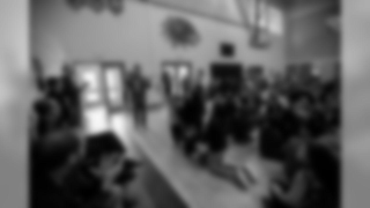 NFL Next 100 Super Bowl commercial contest winner Judah gets surprised by Detroit Lions kicker Matt Prater (5) at a Detroit Lions youth football assembly at Knapp Forest Elementary School, Monday, Jan. 27, 2020, in Grand Rapids, Mich.