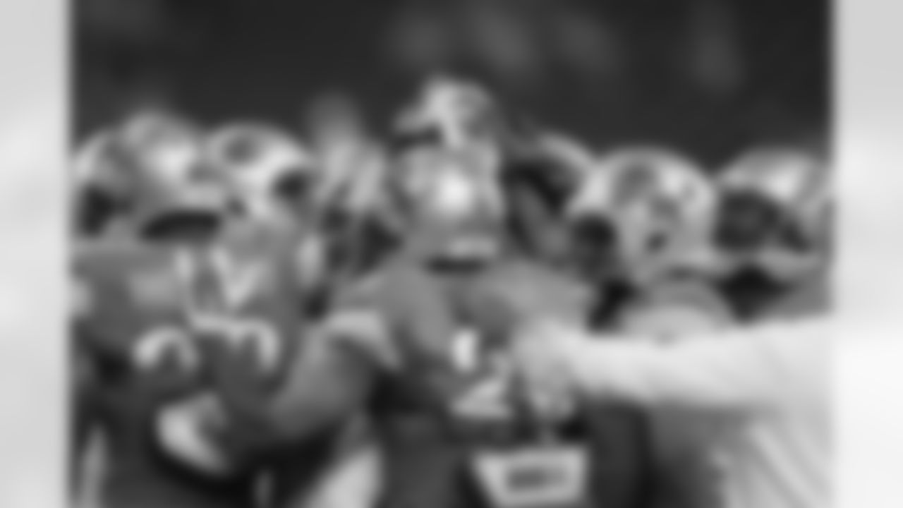 The Detroit Lions huddle during warmups before an NFL football game against the New Orleans Saints in Detroit, Sunday, Oct. 19, 2014. (AP Photo/Carlos Osorio)
