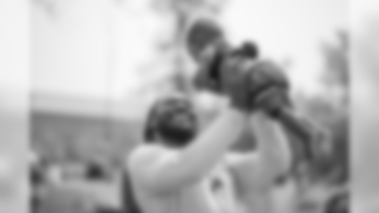 Detroit Lions running back LeGarrette Blount spends time with his family following training camp practice on Wednesday, Aug. 15, 2018 in Allen Park, Mich. (Detroit Lions via AP)