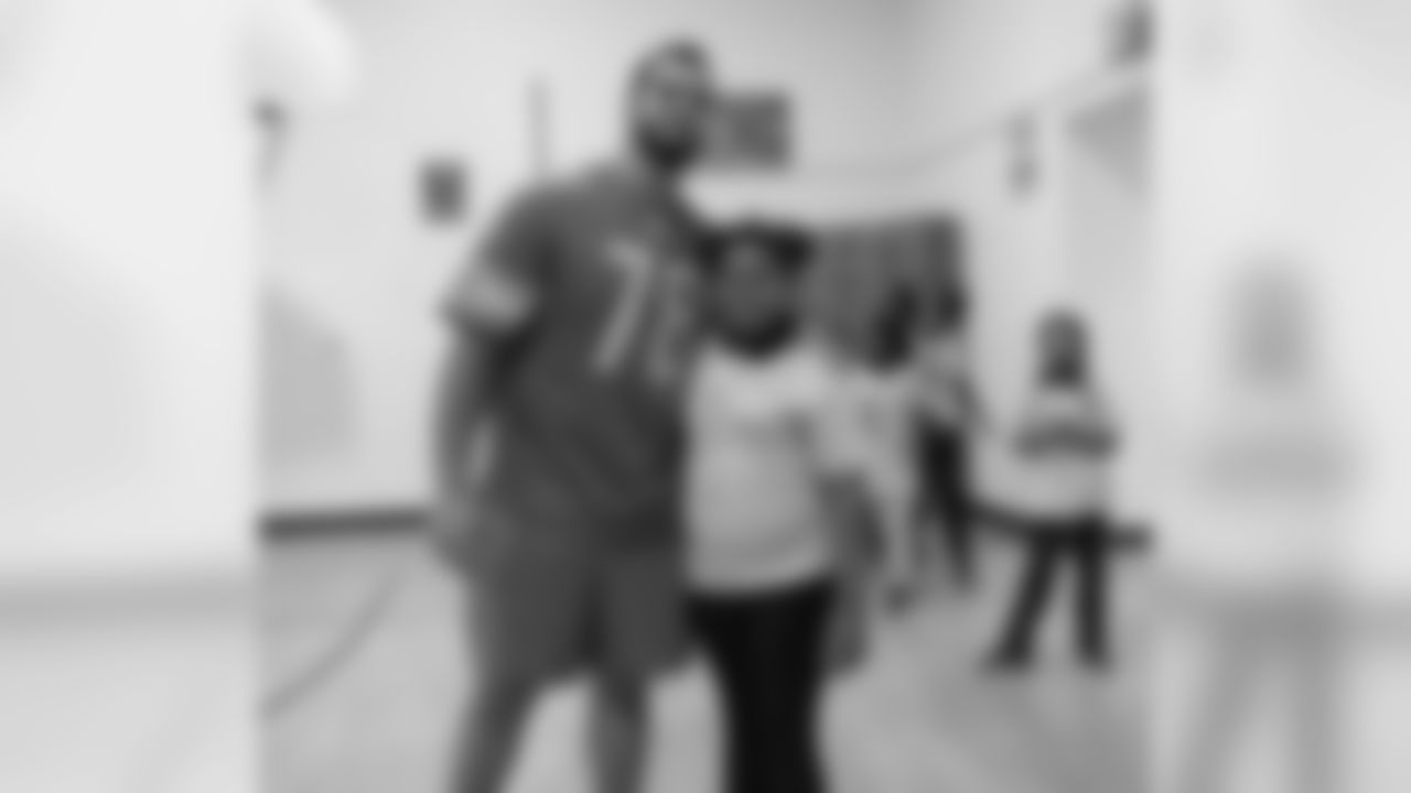 Detroit Lions offensive lineman Oday Aboushi (76) with students at Mason Academy to celebrate National Bullying Prevention Month with Playworks Tuesday, Oct. 22, 2019 in Detroit.