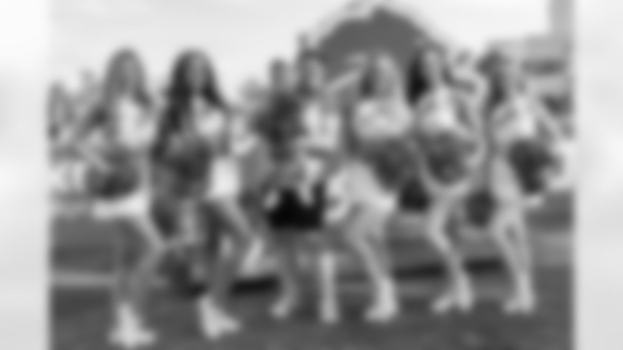 The Detroit Lions Cheerleaders posing for a photo with fans during Detroit Lions Training Camp at the Detroit Lions Training Facility in Allen Park, MI on August 1st,2022. (Steven Stark/Detroit Lions)