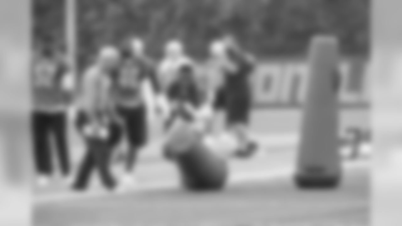 Detroit Lions linebacker Devon Kennard (42) works through a drill as Detroit Lions linebacker Christian Jones (52), Detroit Lions defensive coordinator Paul Pasqualoni and Detroit Lions linebacker Jarrad Davis (40) look on during Day 4 of OTAs on Wednesday, May 29, 2019 in Allen Park, Mich. (Detroit Lions via AP)