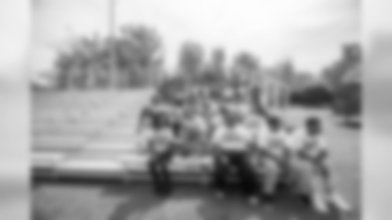 Detroit Lions players take a group photo with students from Detroit Lions Academy as part of Season Launch Week presented by Rocket Mortgage Tuesday, Sept. 10, 2019 in Allen Park, Mich.