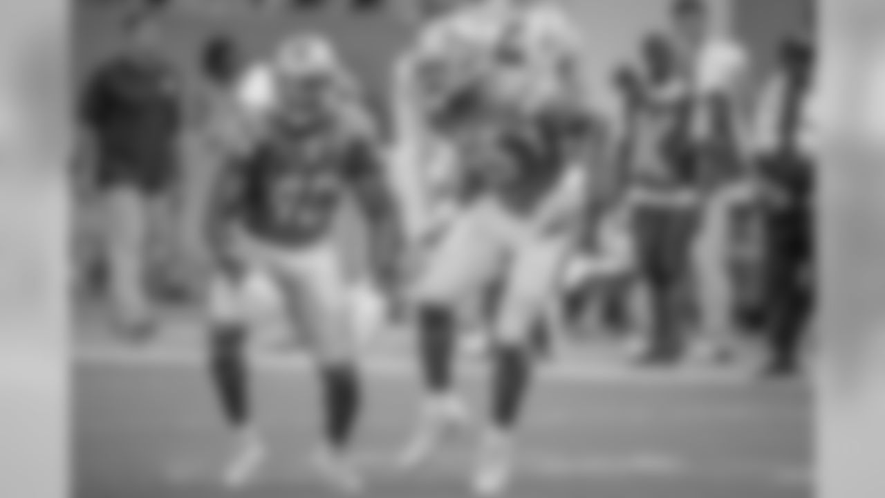 Detroit Lions linebacker Jarrad Davis (40) and Detroit Lions defensive end Romeo Okwara (95) celebrate a sack during a NFL football game against the Miami Dolphins on Sunday, Oct. 21, 2018 in Miami Gardens, Fla. (Detroit Lions via AP).