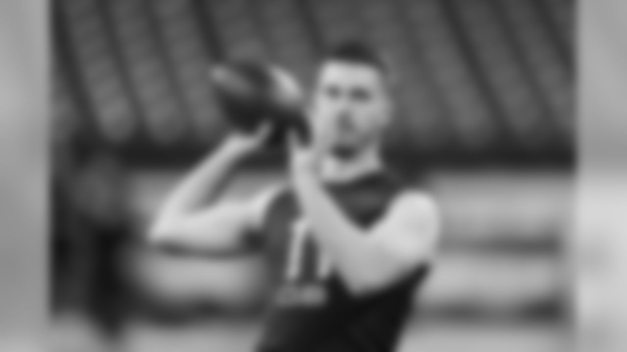Oregon State quarterback Jake Luton runs a drill at the NFL football scouting combine in Indianapolis, Thursday, Feb. 27, 2020. (AP Photo/Charlie Neibergall)
