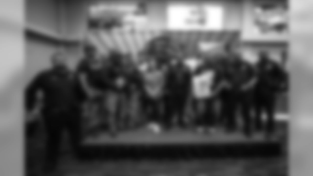 Charles Washington, Teez Tabor, Devon Kennard, Da'Shawn Hand and Tavon Wilson join participants for a conversation on social resilience at on Thursday, June 7, 2019 in Detroit.