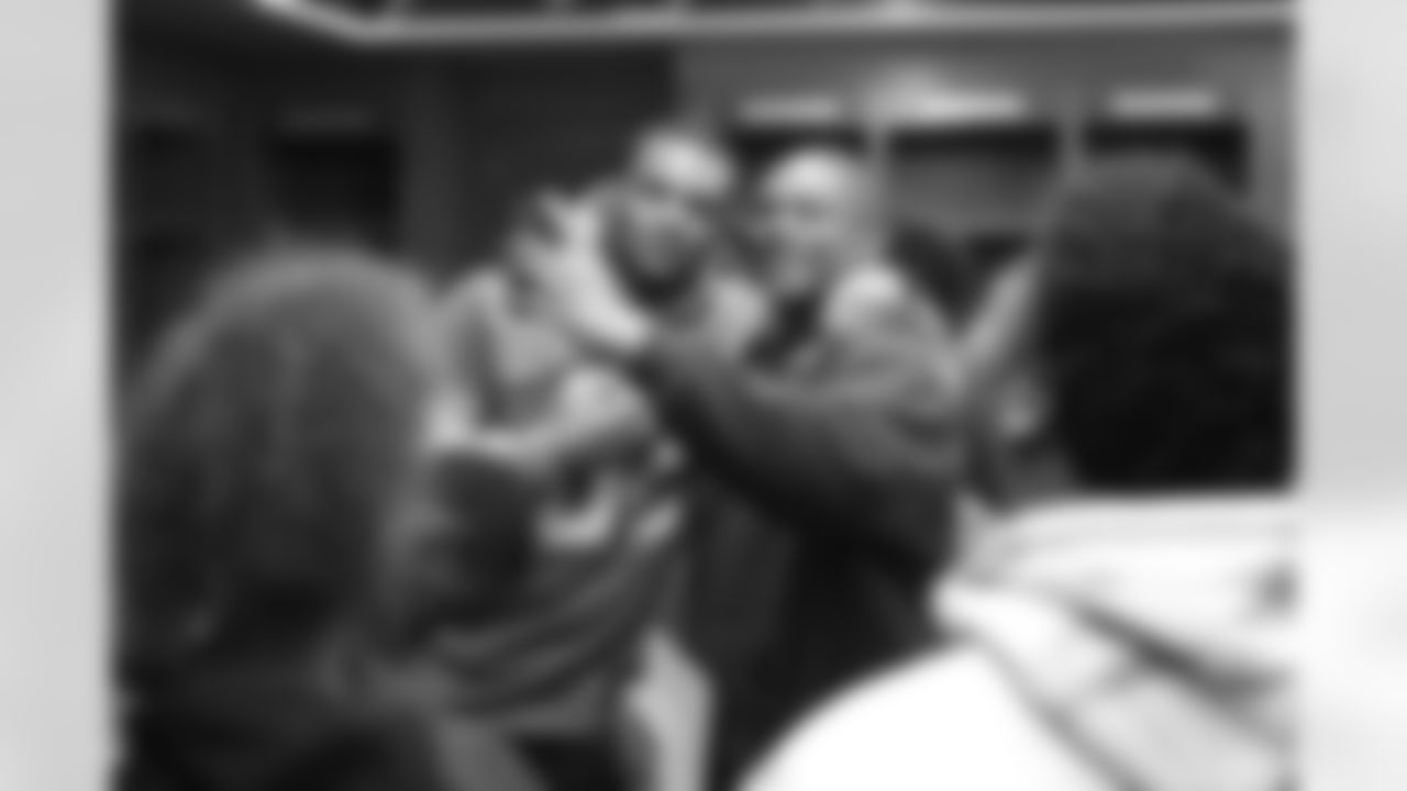 Detroit Lions defensive lineman Da'Shawn Hand (93) takes a selfie at a pizza party with students from Renaissance High School in the Ford Field locker room on Wednesday, May 8, 2019 in Detroit.