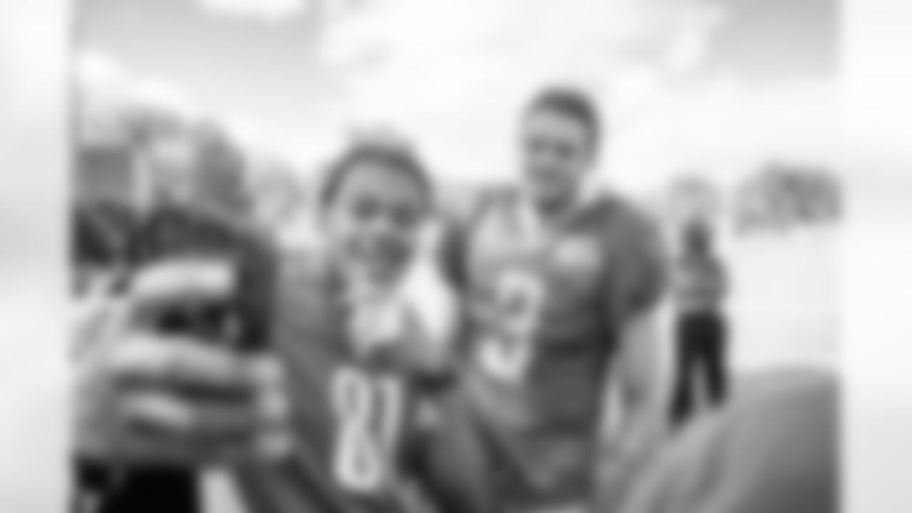Punter Jack Fox takes a selfie with a fan at the Detroit Lions Training Facility in Allen Park,MI on August 9, 2022. (Troy Anderson/Detroit Lions)