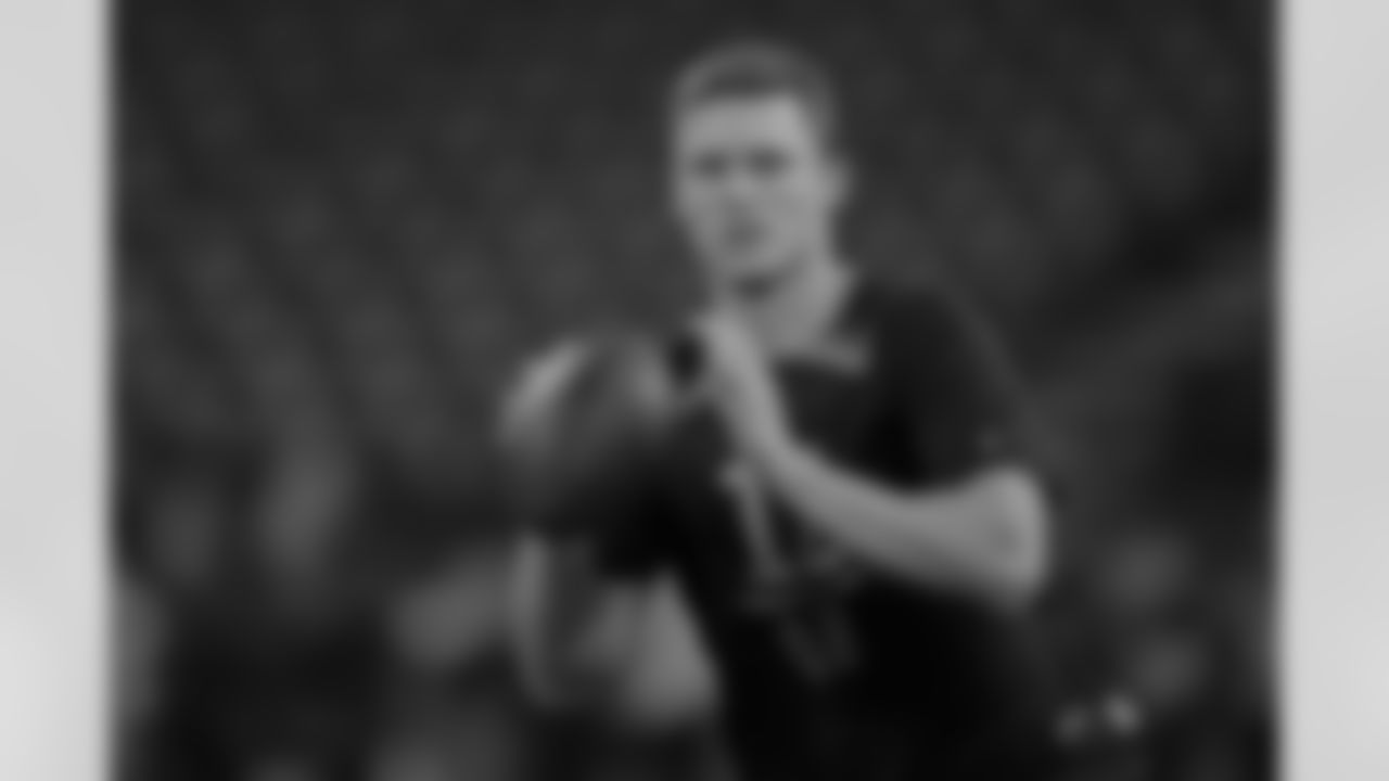 Boise State quarterback Brett Rypien runs a drill at the NFL football scouting combine in Indianapolis, Saturday, March 2, 2019. (AP Photo/Michael Conroy)