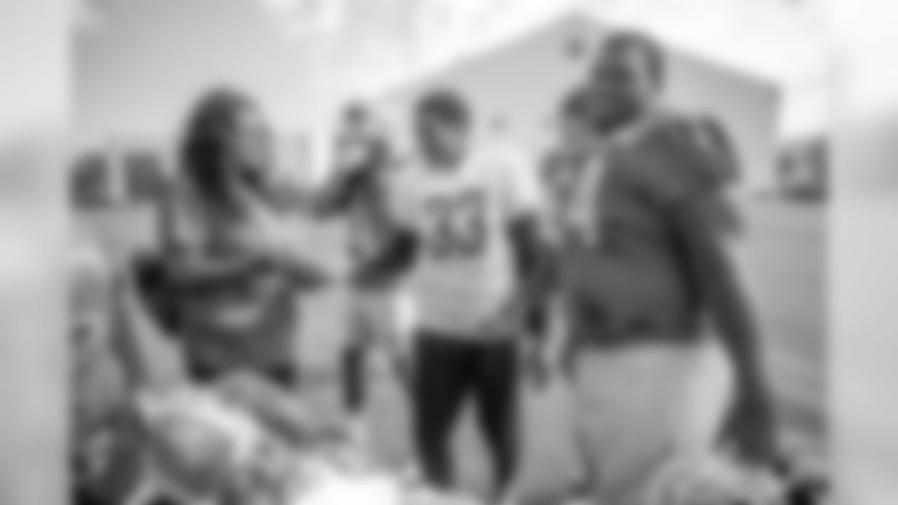 Detroit Lions players with Tra'Markis Lewis, who visited the team with Make-A-Wish, on Thursday, Aug. 22, 2019.