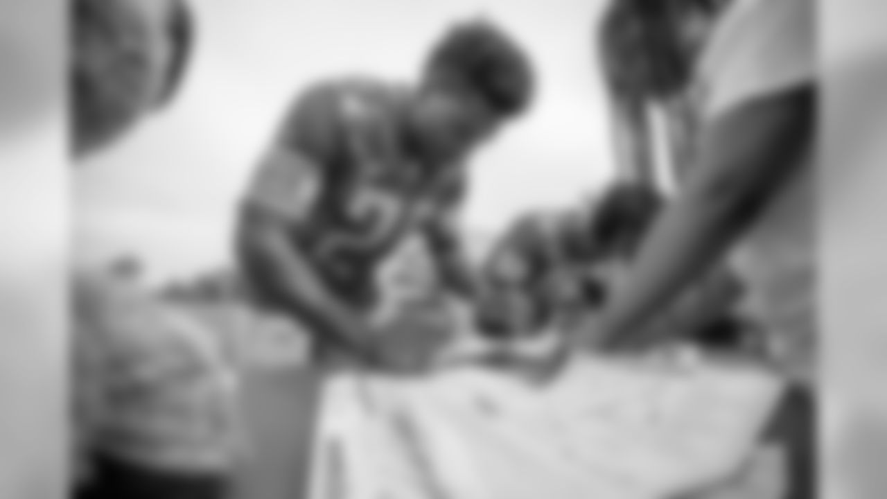 Detroit Lions safety Will Harris (25) helps build rockets with students from Detroit Lions Academy as part of Season Launch Week presented by Rocket Mortgage Tuesday, Sept. 10, 2019 in Allen Park, Mich.