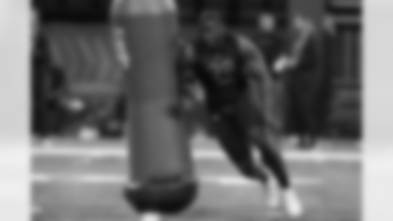 Kentucky defensive lineman Joshua Paschal runs a drill during the NFL football scouting combine, Saturday, March 5, 2022, in Indianapolis. (AP Photo/Darron Cummings)