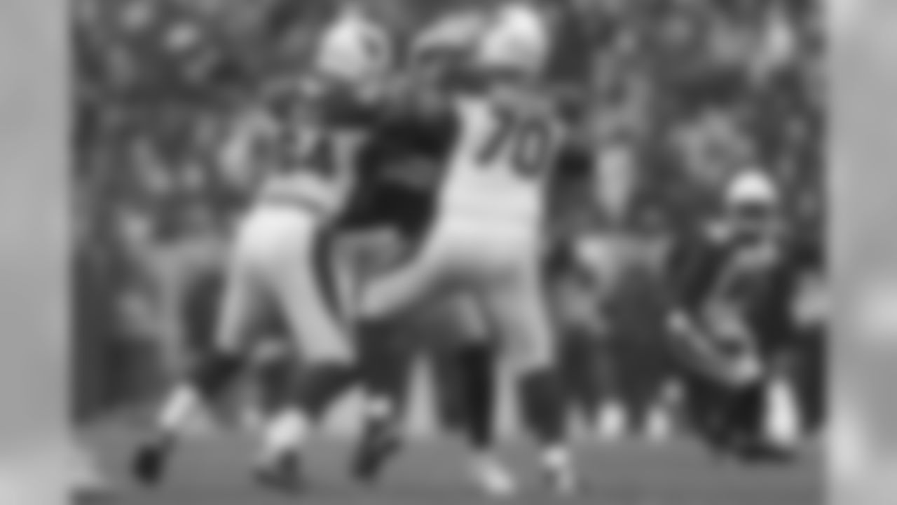 Arizona Cardinals center Mason Cole (64) and Arizona Cardinals offensive guard Oday Aboushi (70) block during a week 13 NFL football game against the Green Bay Packers on Sunday, Dec. 2, 2018 in Green Bay, Wis. Arizona won 20-17. (Aaron M. Sprecher via AP)