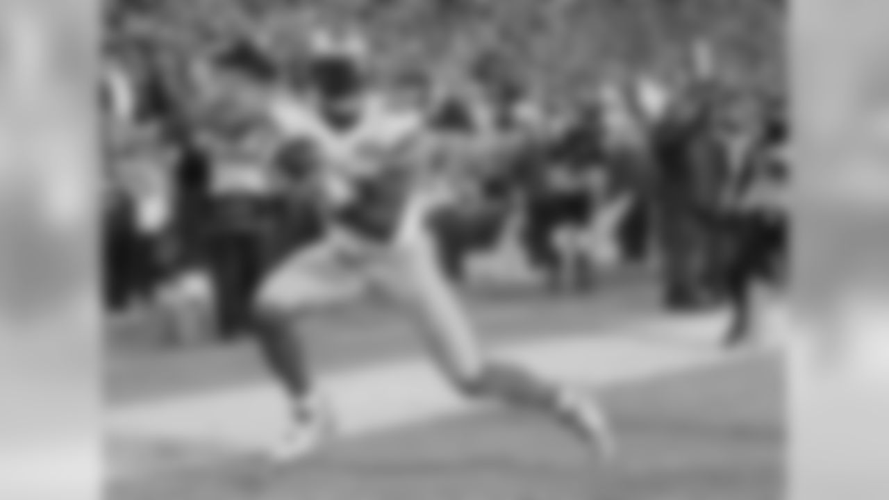 Detroit Lions' Calvin Johnson catches a touchdown pass during an NFL football game against the Green Bay Packers in Green Bay, Wis. (AP Photo/Matt Ludtke, File)