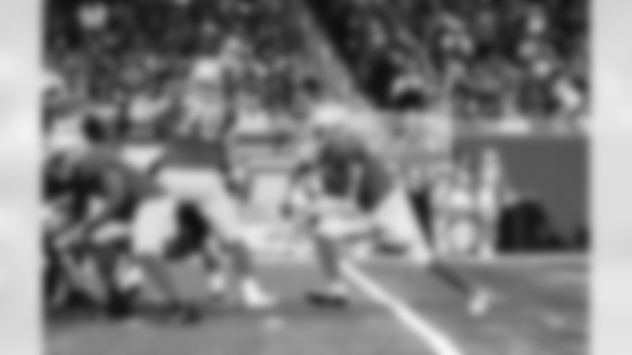 Detroit Lions tackle Dan Skipper (70) and Detroit Lions running back Jamaal Williams (30) during a NFL football game against the Chicago Bears on Sunday, January 1, 2023 in Detroit, MI. (Jeff Nguyen/Detroit Lions).