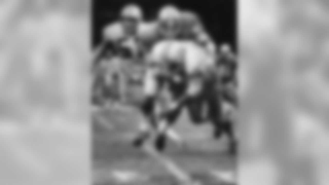 Detroit Lions linebacker Jim Laslavic (52) stops Green Bay Packers running back Jim Brockington (42) during an NFL game in Detroit, Oct. 28, 1973. The Lions defeated the Packers 34-0. (AP Photo/Vernon Biever)